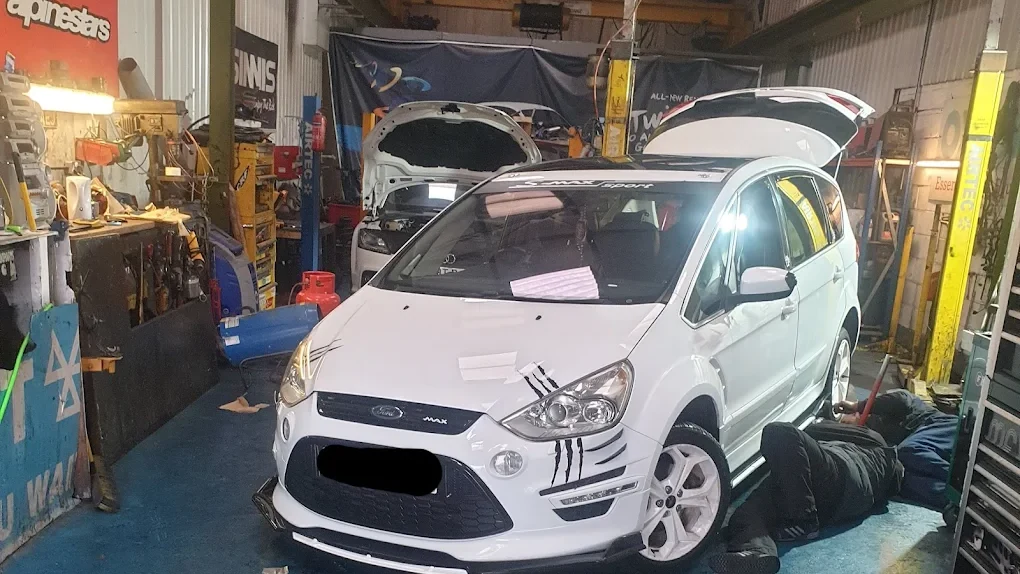 vehicle on ramp in workshop