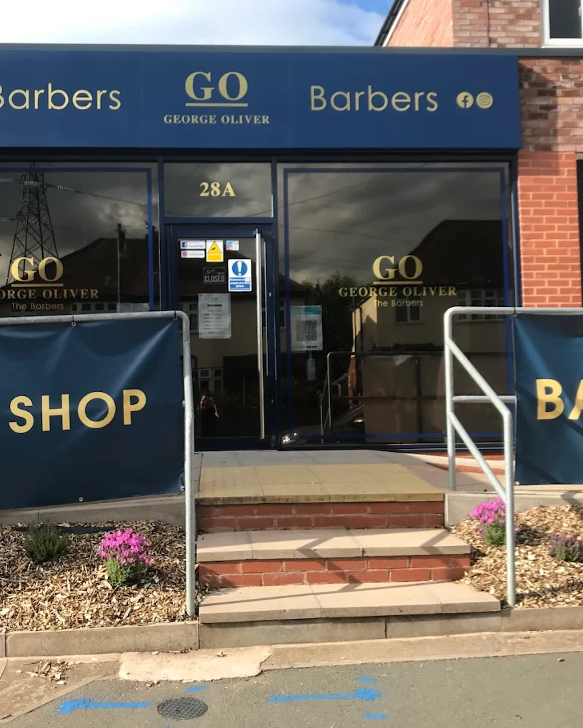 barber at work, mid-fade in progress